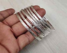 Set di 7 braccialetti in