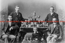 F024156 men with child and - a,