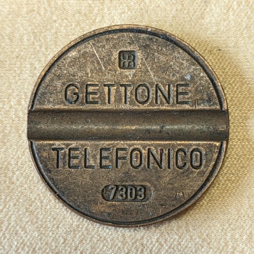 Gettone telefonico 7303 - telefonico,