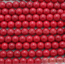 Perline tonde con pietre