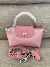 Mini borsa a tracolla Longchamp Le Pliage XS rosa chiaro marsupio outlet