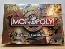 Brettspiel / Gesellschaftsspiel - Monopoly Deluxe - ( ab 8 Jahren ) - 11909156