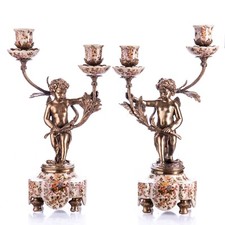 Coppia di candelabri putti -