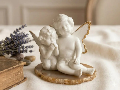 Coppia statuine cherubino