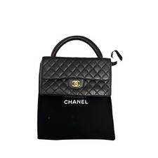 L'Iconica Borsa Chanel Vintage Nera: Eleganza Trapuntata con CC Dorata!