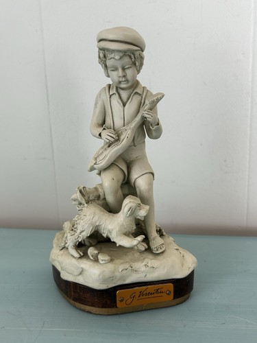 Statuina porcellana ragazzo