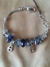 BRACCIALE METALLO CON ELEMENTI