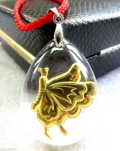 Piccolo farfalla oro - un,