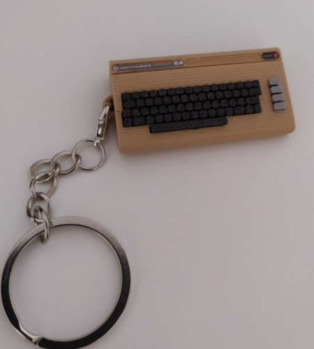 Brown commodore keychain - commodore,