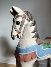 cavallo a dondolo in legno