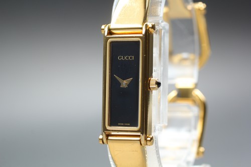 Near mint gucci 1500l gold - mint],