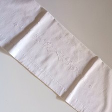 Lenzuolo culla ricamato a mano