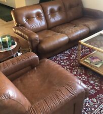 Divano e poltrona in pelle da