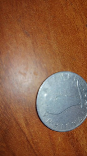 Moneta lire con delfino del - 5,