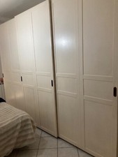 armadio 3 ante scorrevoli, in legno massiccio realizzato da maestri artigiani . 