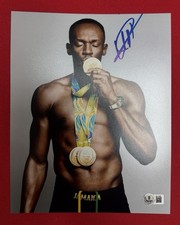 Usain Bolt foto autografata