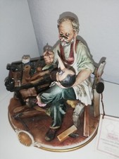 Figurina Capodimonte Geppetto e Pinocchio