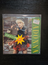 MADONNA " CAUSING A COMMOTION