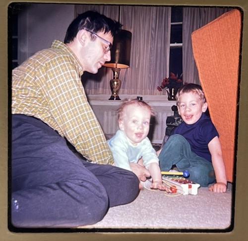 Dad playing with kids fisher - with,