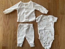 vestito neonato che torna a