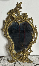 Antico specchio in bronzo