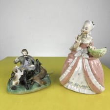 coppia di statuine in ceramica
