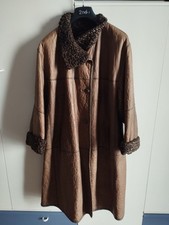 Cappotto in pelle ed Astrakan