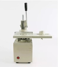 Punzonatrice occhiello tenda