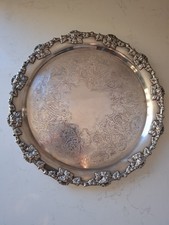 Pesante antico vassoio tondo