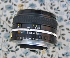 ob. Nikon grandangolare 28mm f 1:2.8 serie E ottime condizioni filtro UV omaggio