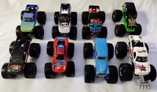 LOT OF 8 Monster Jam Trucks 1:64 Reptoid Spider-Man Madusa Predator Digger +3
