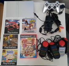 Playstation 2 slim silver + Cavi suoi + 1 joystick + 5 giochi + Memory card da 8