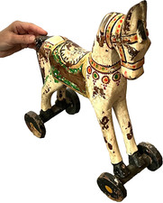 VINTAGE INDIAN HORSE ON WHEELS