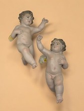 Coppia puttini angeli occhi di