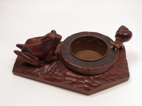 Scultura legno distributore - in,