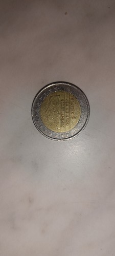 Moneta euro con errore di - con,