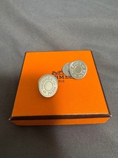 Gemelli logo Hermes argento