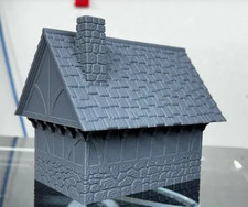 Casa in pietra e legno per