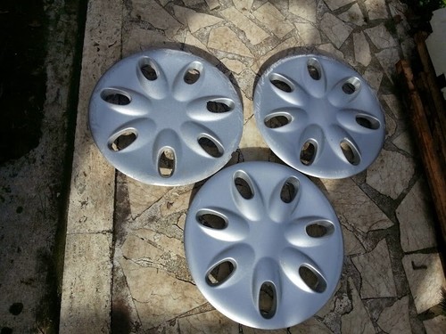 Coppa copricerchi borchie - 1,