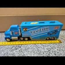 Disney Pixar CARS 3 - Camion Mack 39 (23-36 cm)