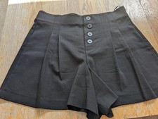 Pantaloncini plissettati a