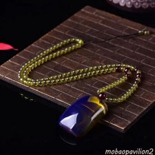 Collana con ciondolo ambra blu