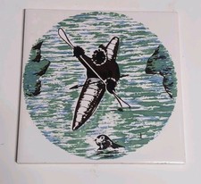 Eschimese su canoa, foca