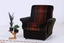 Poltrona vintage con braccioli