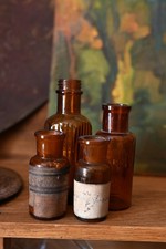 Set di Vecchie bottigliette da farmacia in vetro marrone anni 30