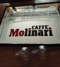 Collezionismo:specchio pubblicitario e tazzine "caffe' Molinari"