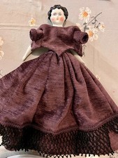 Bambola vintage in vestito