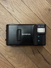 Olympus AM-100 punta e scatta