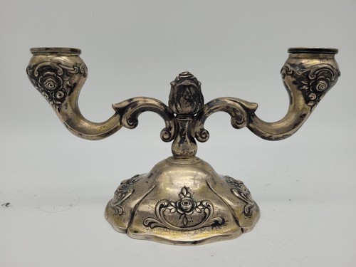 Antico candelabro stile