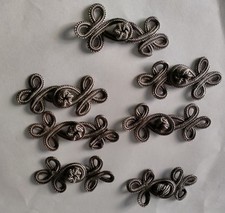 7 alamari grigi passamaneria soutache medi  (foto 3 misura) 7 cm circa seta?